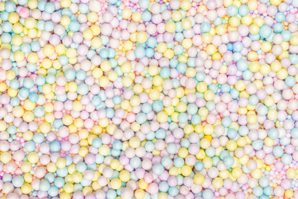 istock Purple, yellow, blue plastic balls. 1284056450
