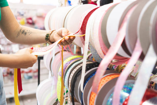 istock Woman chooses satin ribbon 1284057183