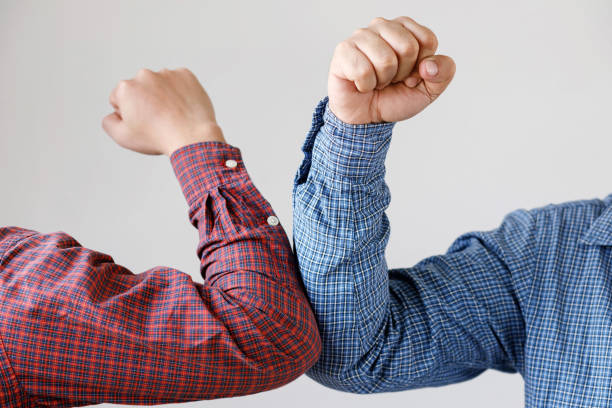 istock Businessmen keep their distance to prevent COVID 19 1284057307