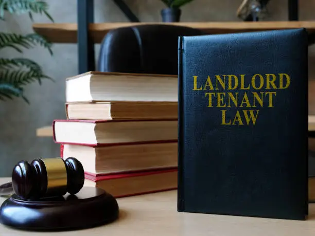 Photo of Landlord tenant law book on the lawyer desk.