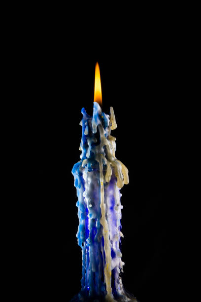 istock Candle wax dripping from wax candle showing textures and dripping wax patters 1284058663