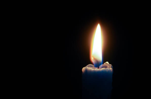 istock Candle wax dripping from wax candle showing textures and dripping wax patters 1284058676