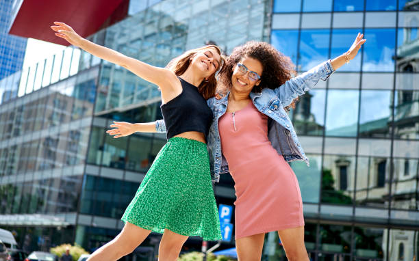 istock Image of two young happy women 1284058856