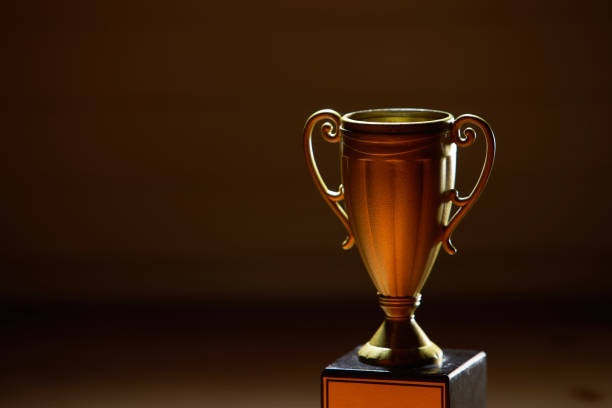 istock trophy on the wood background 1284059445