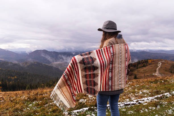 istock Wanderlust concept. Woman in boho style in the mountains 1284061906