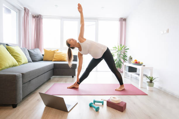 istock Pregnant Woman Exercising At Home. 1284062023