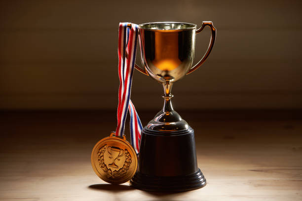 istock trophy and medal on the wood background 1284062138