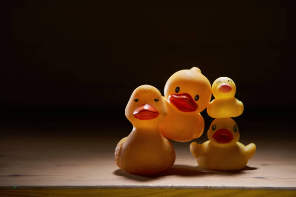 istock group of rubber duck on the wood background 1284062213
