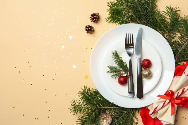 istock Concept of New year table setting on beige background, top view 1284062487