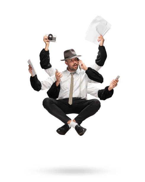istock Handsome multi-armed journalist levitating isolated on yellow studio background with equipment 1284065586