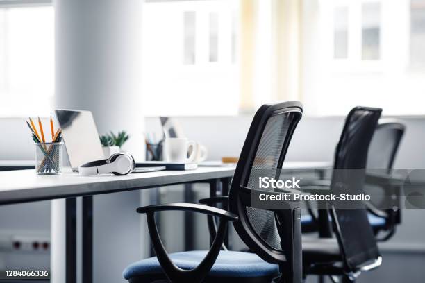 Modern Gadgets In Interior Of Coworking Office During Covid19 Epidemic Stock Photo - Download Image Now
