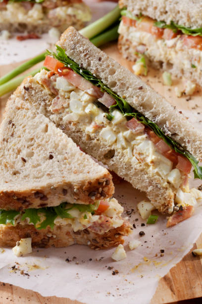 istock Egg Salad Sandwich with Crispy Bacon, Lettuce and Tomato 1284067874