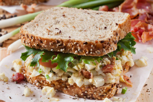 istock Egg Salad Sandwich with Crispy Bacon, Lettuce and Tomato 1284068295