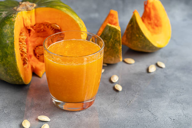 istock Fresh pumpkin juice with cinnamon, autumn drink concept. Vitamin drink. 1284068972