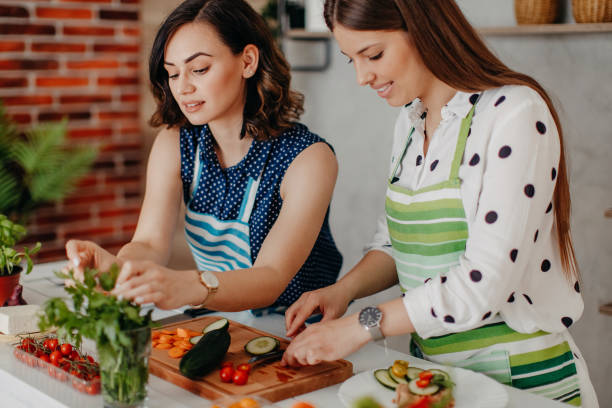 istock Best friends prepare a healthy meal 1284069679