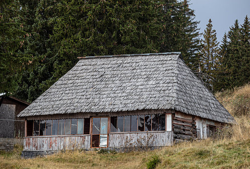 Transalpina,  Romania - October 24, 2020: Old, abandoned cottage in the mountain resort Ranca ,  Transalpina,  Romania.