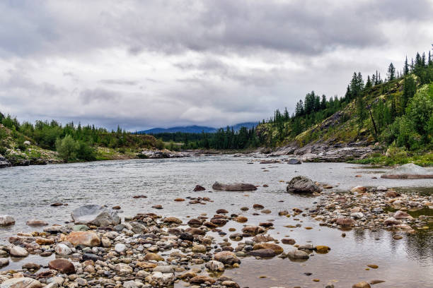 istock northern river flowing among the rocks in a forest area 1284073099