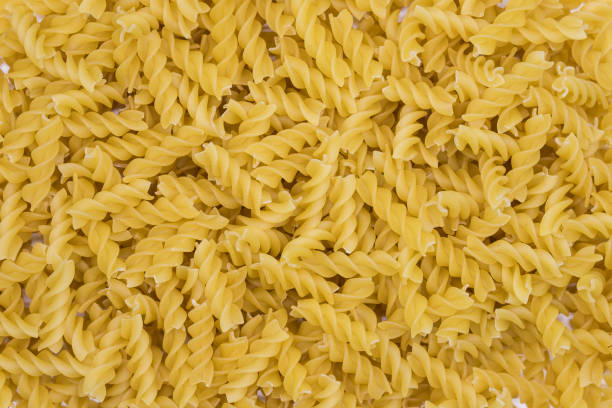 istock Selection of different pasta types on a white background. Healthy organic flat lay 1284074748