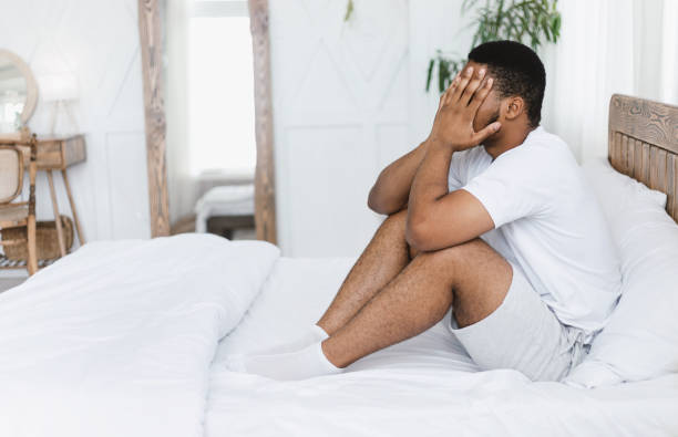 istock African American Guy Touching Aching Head Having Headache Pain Indoor 1284074761