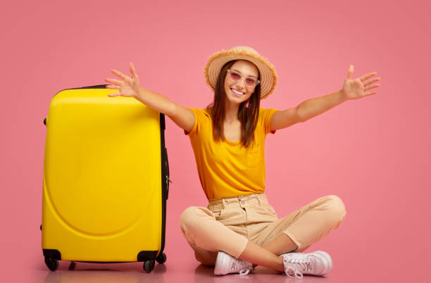 istock Young happy woman outstretching hands to camera 1284074818