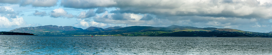 Panorama of Inishowen peninsula, County Donegal, Ireland, taken from Inch Island Pier looking North East under a cloudy sky
