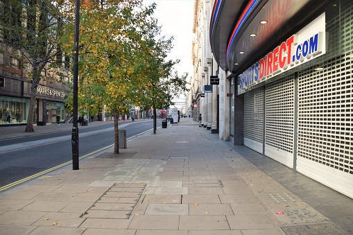 London, United Kingdom - November 5 2020: Empty Oxford Street and closed shops on the first day of the second nationwide lockdown in England