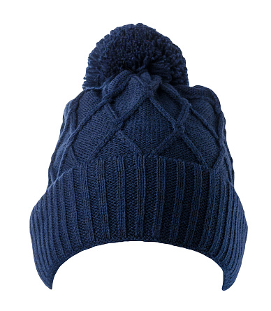 knitted dark blue hat isolated on white background.hat with pompon .