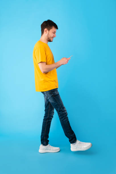 istock Portrait of handsome young man using his mobile phone 1284084525
