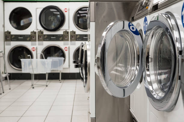 istock cleaning machine door in the public laundry 1284084690