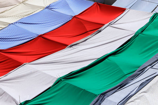 istock Colorful fabrics cover in an arab market 1284084714