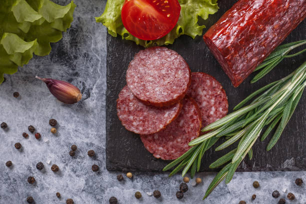 dry-cured sausage with spices, garlic and herbs  . - 2333 imagens e fotografias de stock