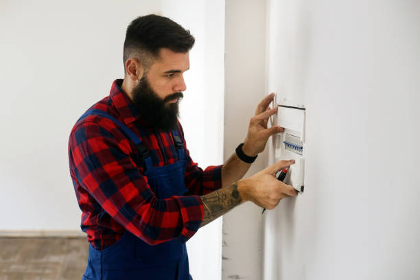istock Electrician repairing a fuse box 1284087908