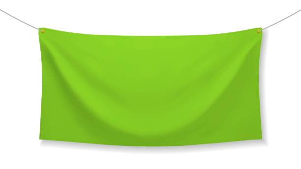istock Green fabric banner with folds isolated on white background 1284089680