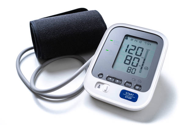 Digital blood pressure monitor Digital blood pressure monitor isolated on white background. The monitor displays an optimal result for adult blood pressure: 120/80mmHg. High resolution 42Mp studio digital capture taken with SONY A7rII and Zeiss Batis 40mm F2.0 CF lens pressure gauge stock pictures, royalty-free photos & images