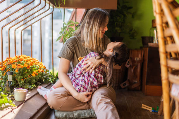 istock Single mother playing with little girl 1284095692