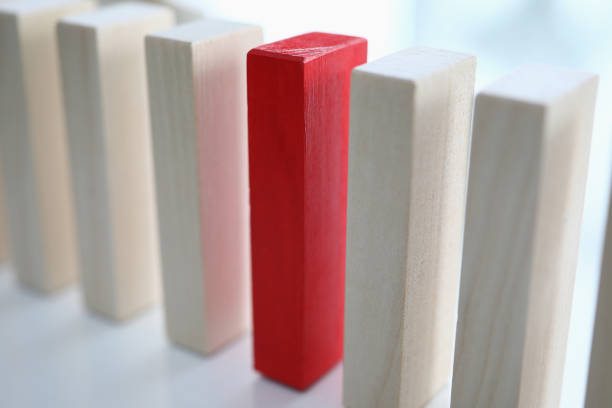 istock White and red wooden blocks stands on a table 1284096681