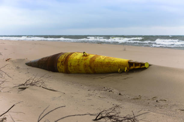 istock sea buoy made of iron, old iron float on the shore 1284099843