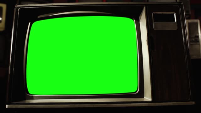 Retro TV Set with Green Screen. Dolly In.