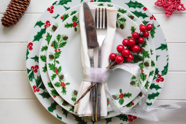 istock Top view of Christmas Table Setting on white wooden table 1284102162