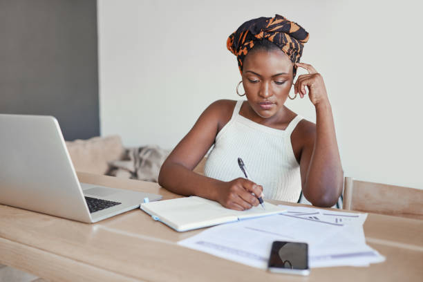istock Focused on completing a few of her tasks 1284106238
