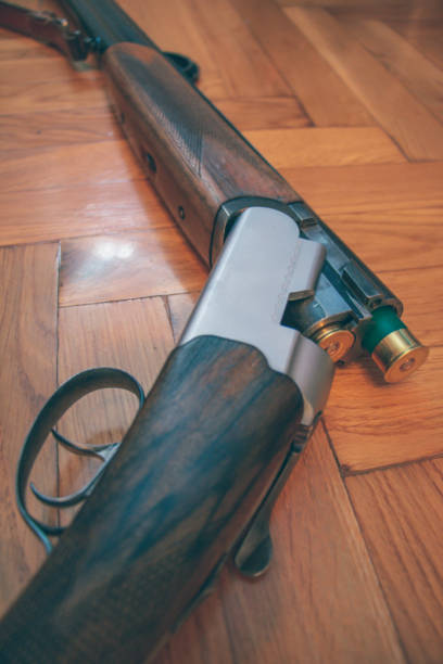 istock Loading shotgun with cartridges during a pheasant shoot stock photo 1284106536