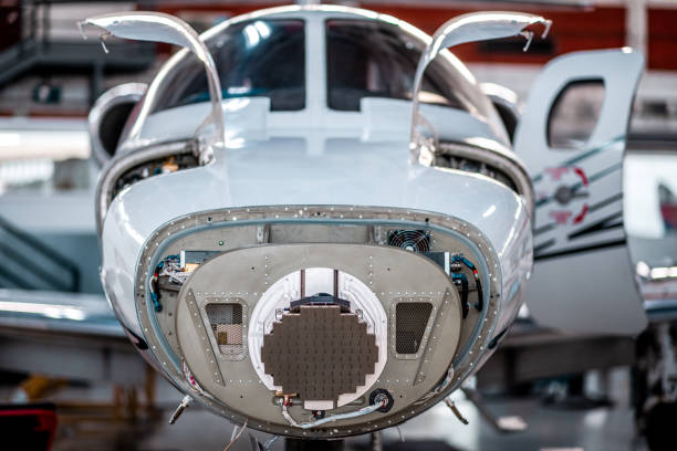 istock Private airplane jet engine checks in the hangar 1284111606