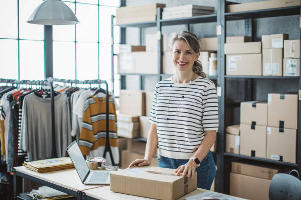 istock Woman running online clothing store 1284112799