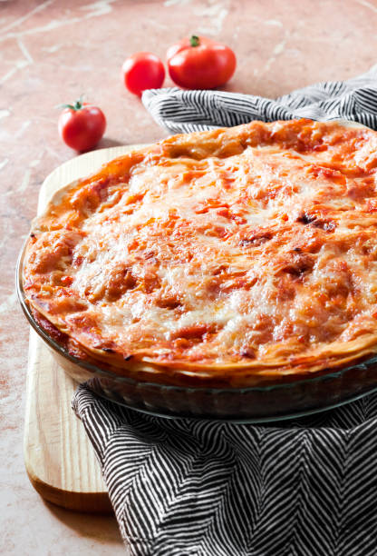 istock Homemade lasagna in round glass baking dish 1284116557