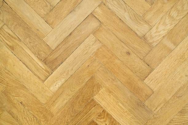 istock Texture background, vintage wooden parquet herringbone, top view 1284121919