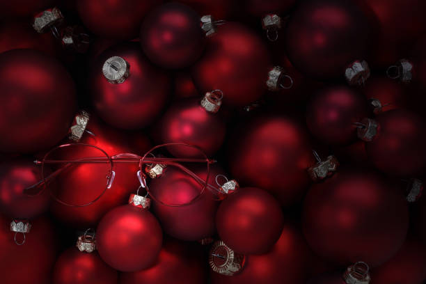 istock merry christmas, eyeglasses red spectacles on balls background, useful as a greeting gift card or promotional template with copy space 1284123156