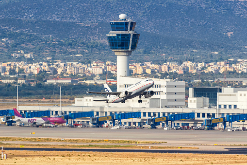 Athens, Greece - September 22, 2020: Aegean Airlines Airbus A320 airplane at Athens Airport in Greece. Airbus is a European aircraft manufacturer based in Toulouse, France.