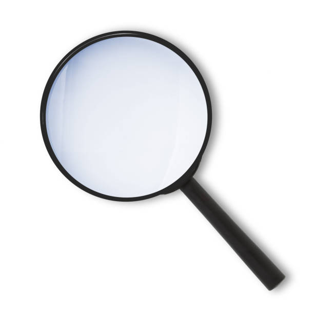 istock Magnifying glass top view with blue tinted lens 1284125145