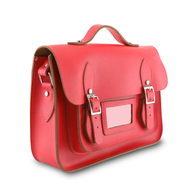 Red school satchel bag with clipping path to remove shadow A Red school satchel bag with clipping path to remove shadow nigel pack stock pictures, royalty-free photos & images