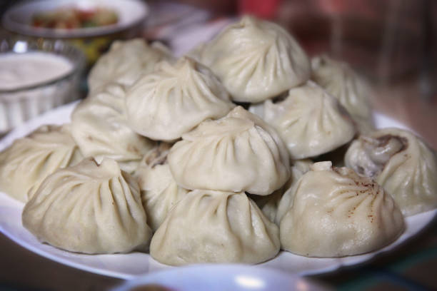 istock buuz - buryatian steamed dumplings on a dish 1284126400